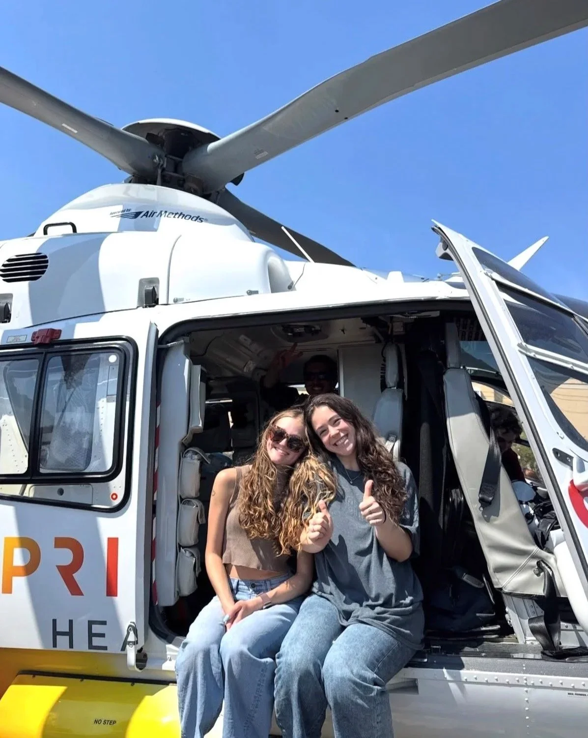 Gamecock EMS members sitting in an air medical helicopter